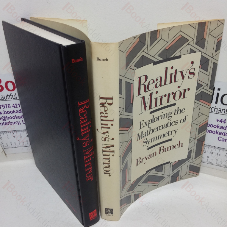Reality’s Mirror: Exploring the Mathematics of Symmetry